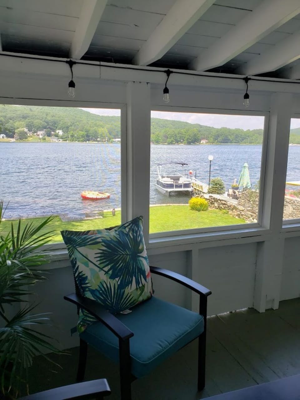 Screened-in porch overlooking lake