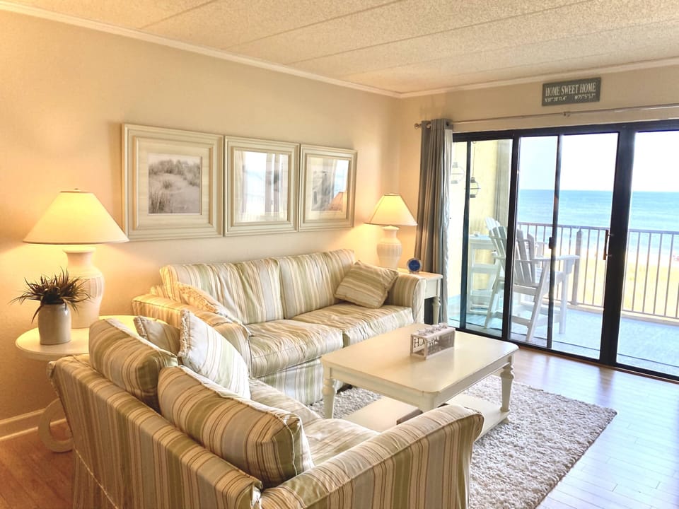 comfortable sitting room with access to balcony