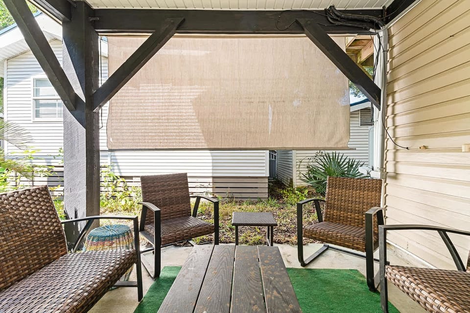 Cozy covered patio with comfortable seating for relaxing gatherings