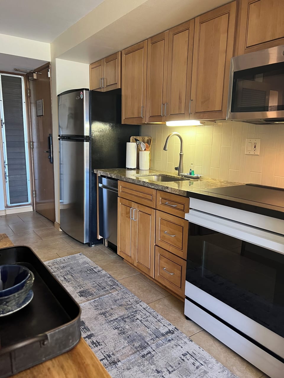 Updated kitchen. Solid granite countertops. 