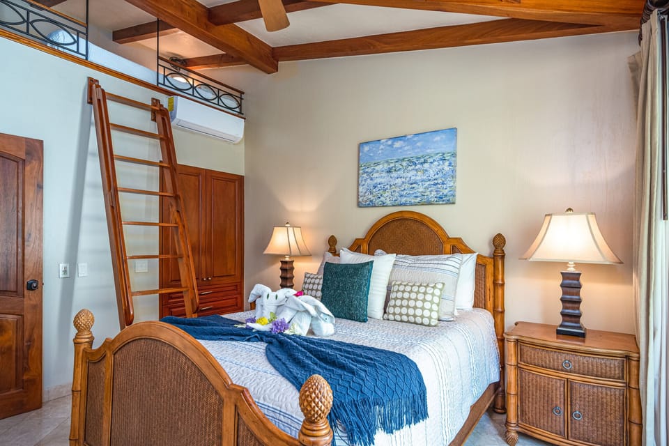 Queen bed with mattress in the loft, beautiful garden views