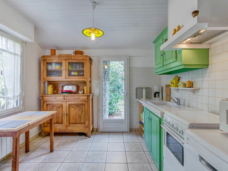 Cabinetry, Furniture, Kitchen Sink, Table, Countertop, Green, Window, Sink, Drawer, Wood