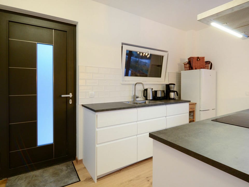 Countertop, Cabinetry, Sink, Property, Tap, Building, Kitchen Sink, Wood, Kitchen, Kitchen Appliance