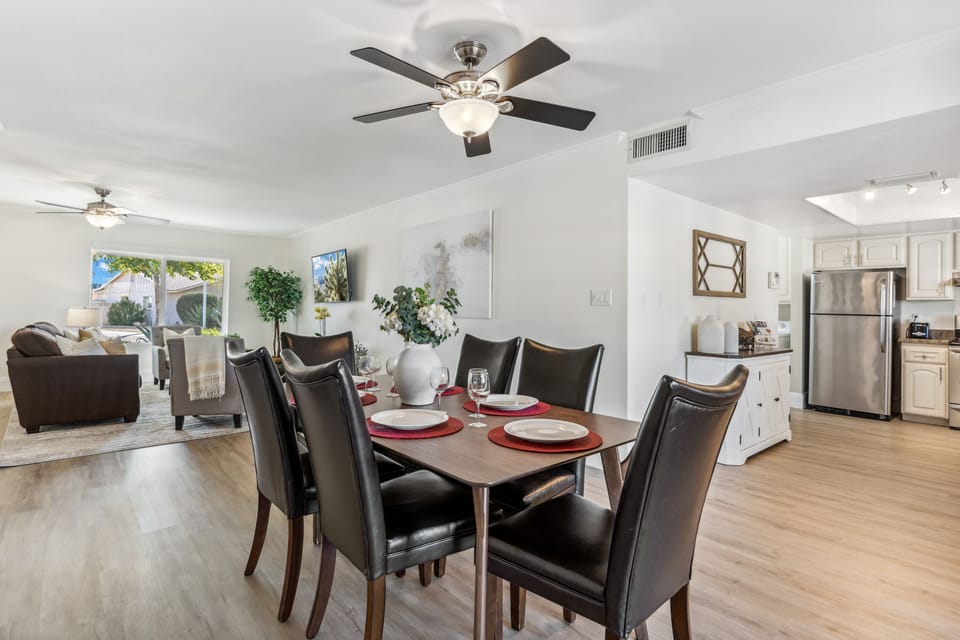 Dining area, kitchen, living room.