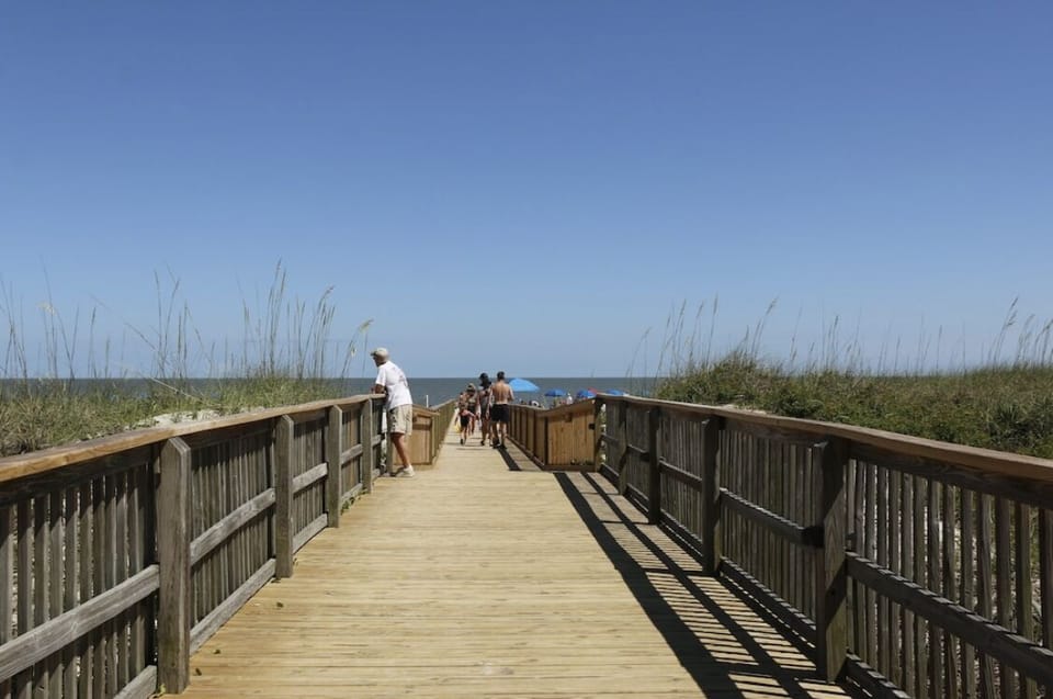 Boardwalk from the pool to the beach