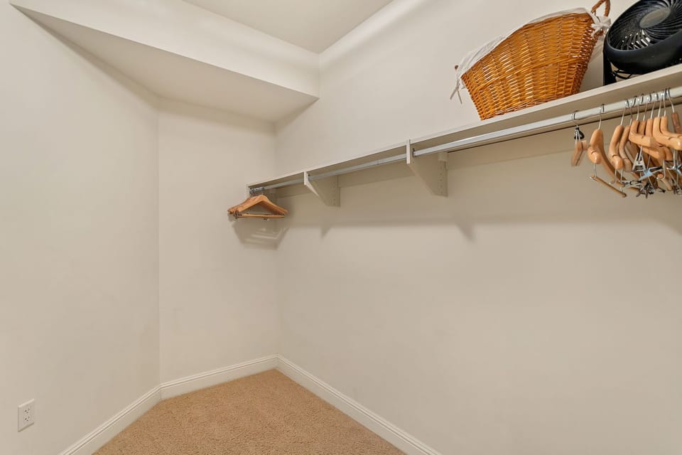 Guest bedroom with large walk in closet