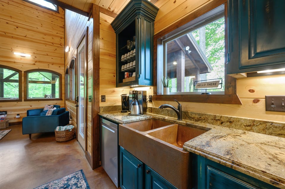 The kitchen is equipped with updated appliances and views to the back yard!