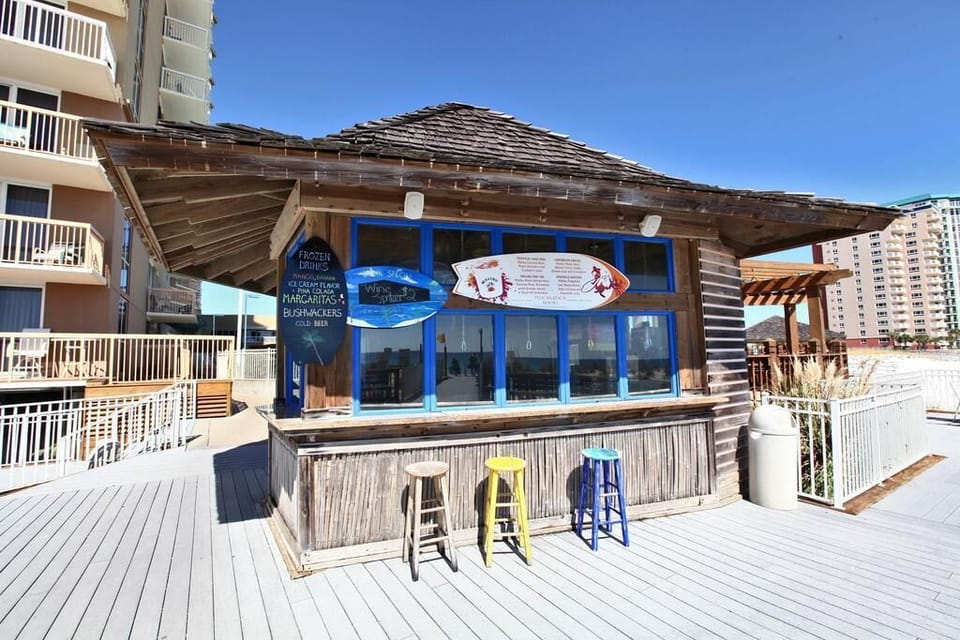 Get food and drinks on the beach at the Tiki Bar!