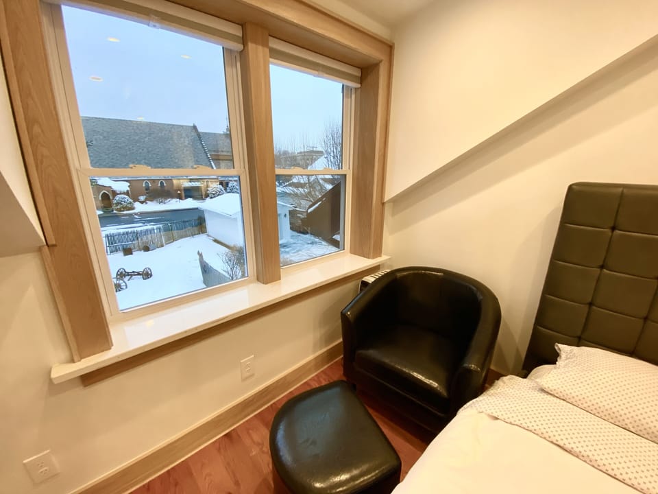Bedroom upstairs with two full beds.
