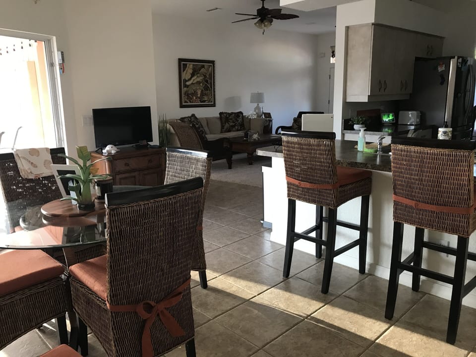 Eat in Kitchen area looking at Living Room to the right and Lanai to the left