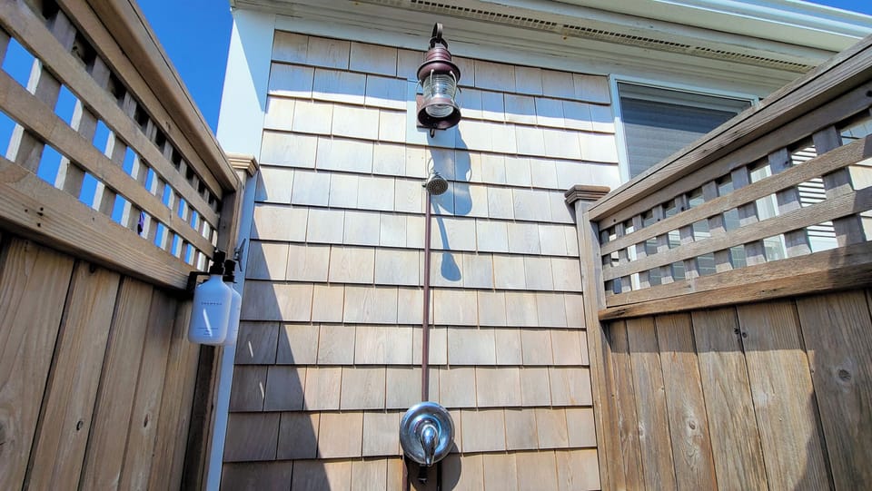 Enjoy the wonderful enclosed outdoor shower with lighting