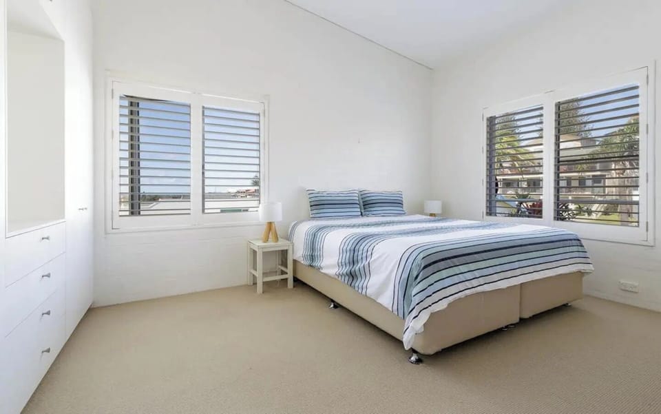 Bedroom 2 is a generous size with a King Bed, high ceilings and multidirectional air flow. 