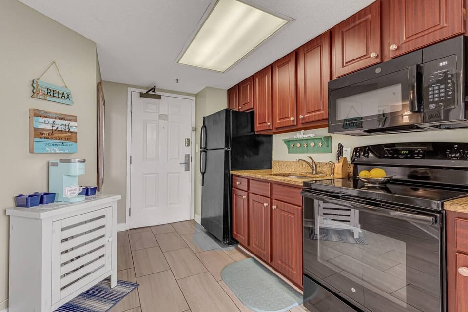 For those moments when you prefer staying in, the recently renovated full kitchen, complete with a granite countertop, comes fully stocked to empower you to prepare delicious homemade meals with ease.