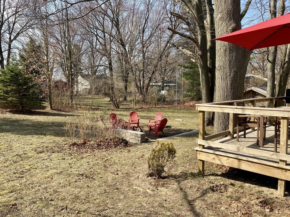 Fire pit in large side yard