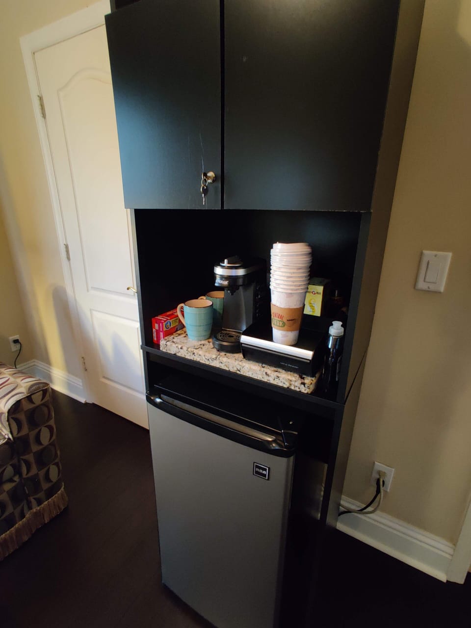 drink fridge, and coffee maker in sitting/TV room