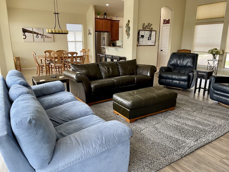 Living & dining room, message board and kitchen view.  Spacious 2100 Sq Ft home.