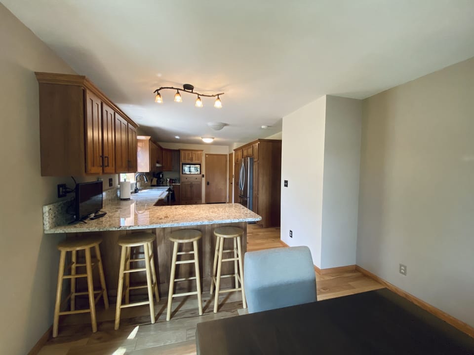 Fully equipped kitchen, seating for all, with complimentary coffee, tea, & more.