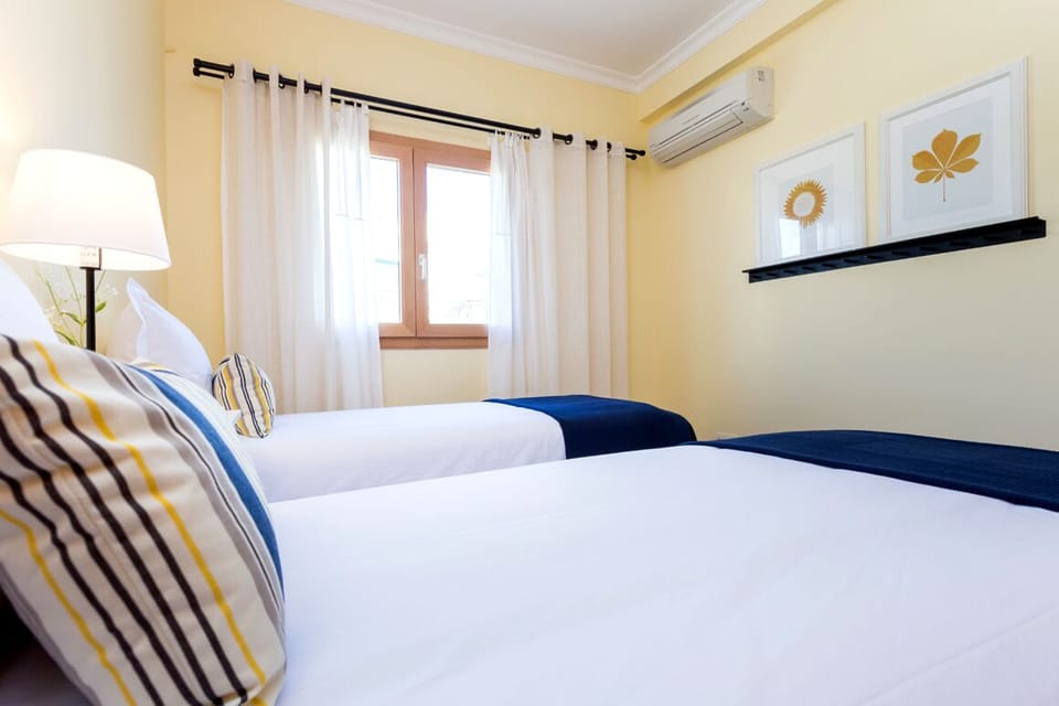 Twin bedroom has fitted wardrobes and is beside the Shower & WC