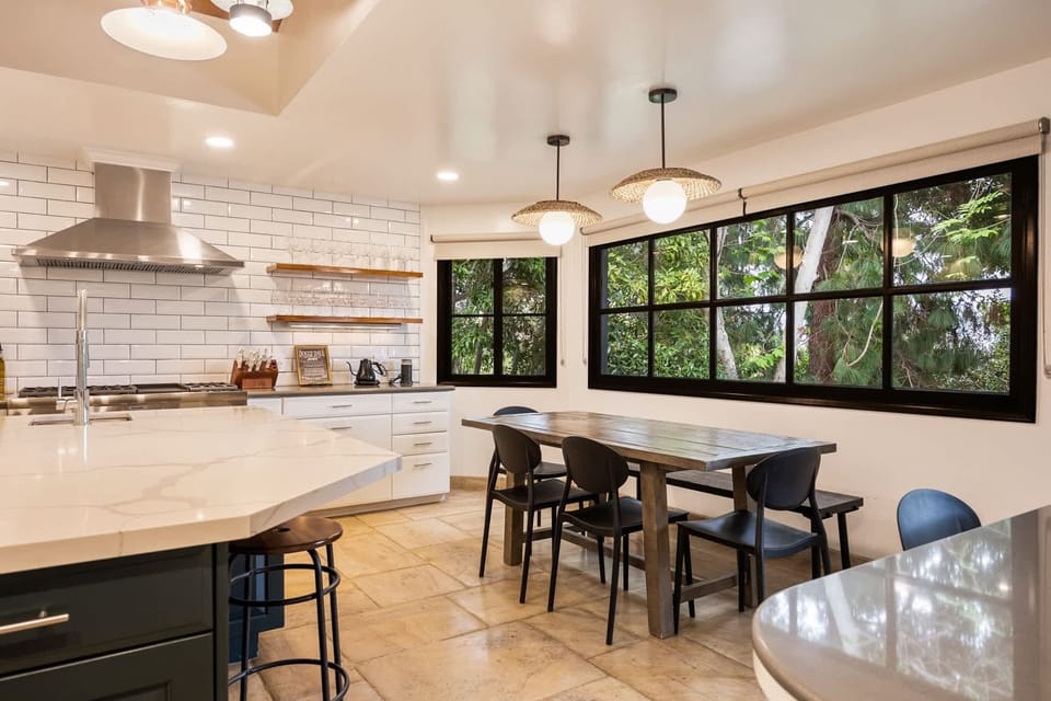Dining nook with seating for six, an ideal spot for brunch or family meals.