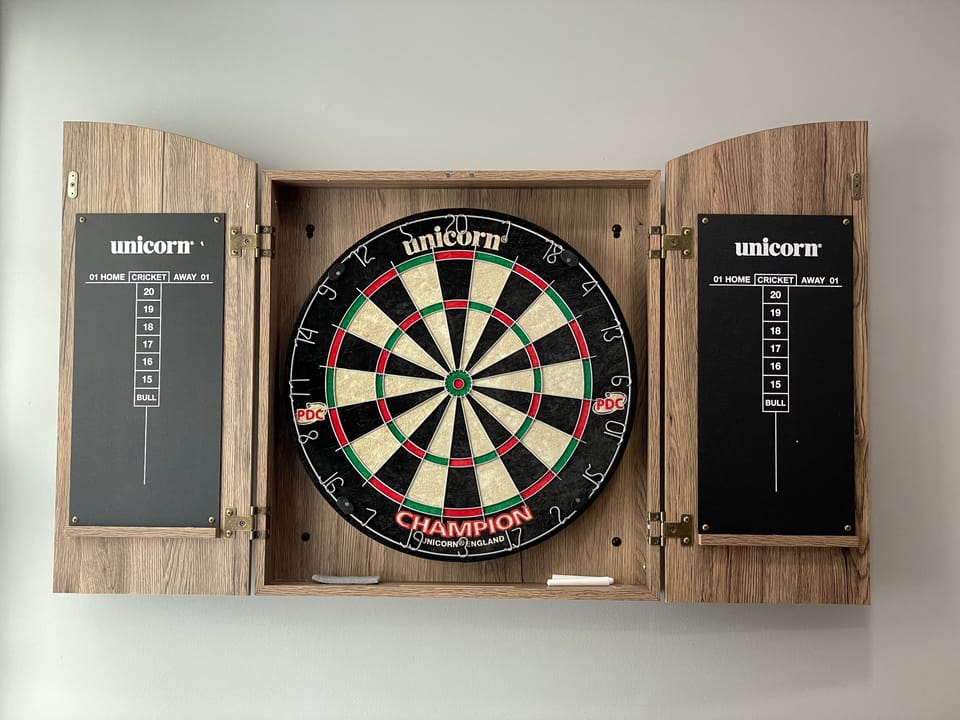 Dartboard in Sunroom. 