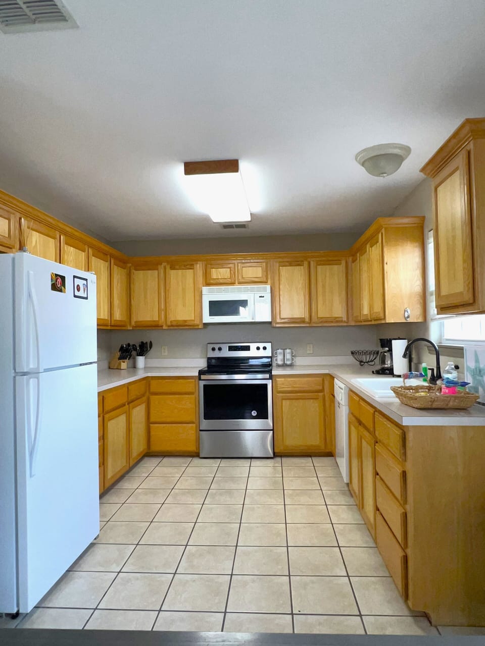 Fully stocked open kitchen for all your cooking needs.