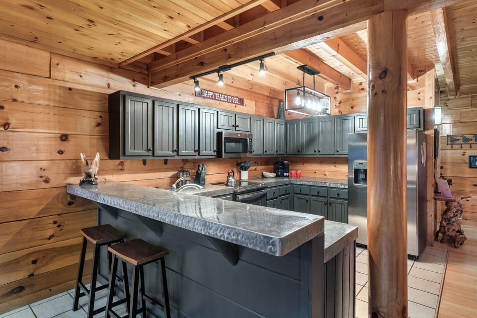 The kitchen is open to the living and dinning rooms. 