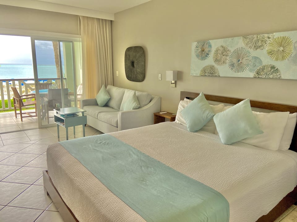 Spacious bed with high quality linens, and an incredible view.