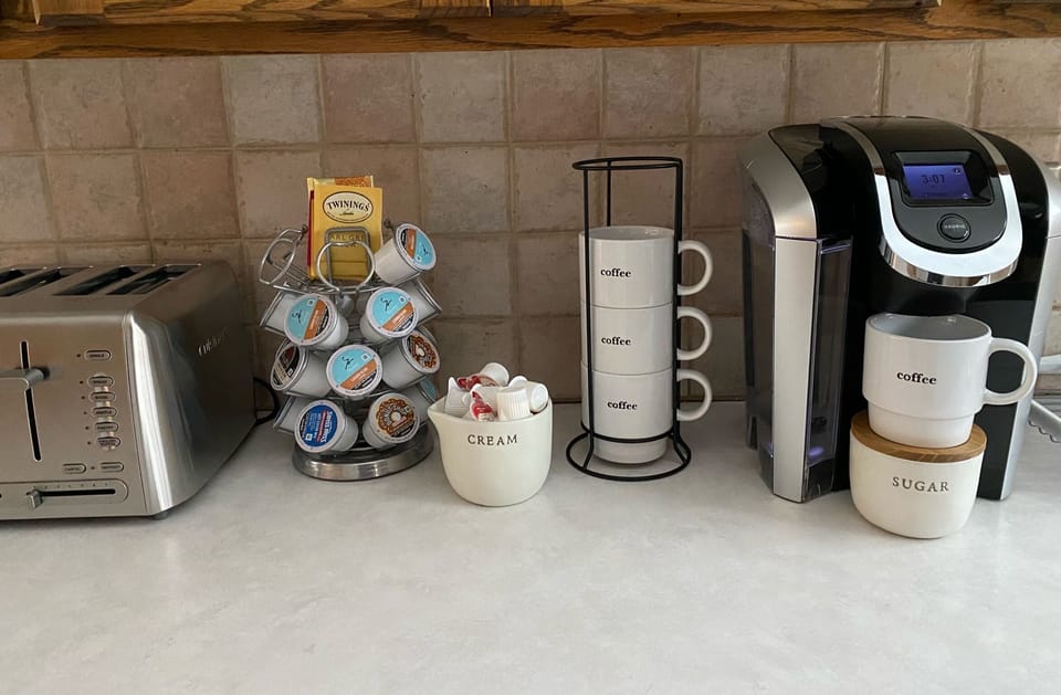 Complimentary Keurig coffee, tea, and condiments 