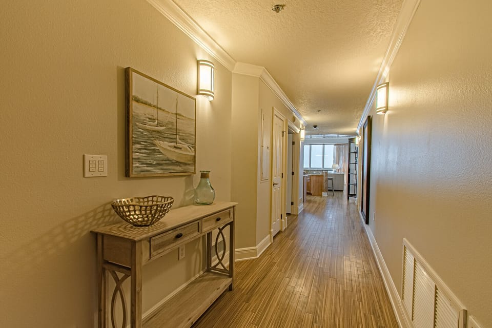 Hallway to master bedroom and kitchen 