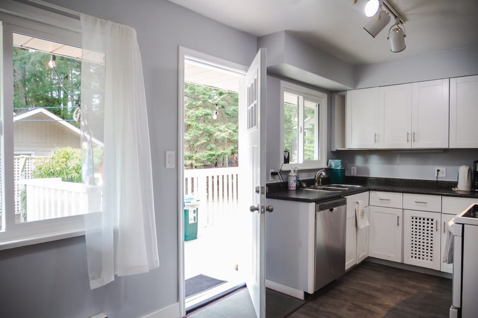 The full kitchen with patio access
