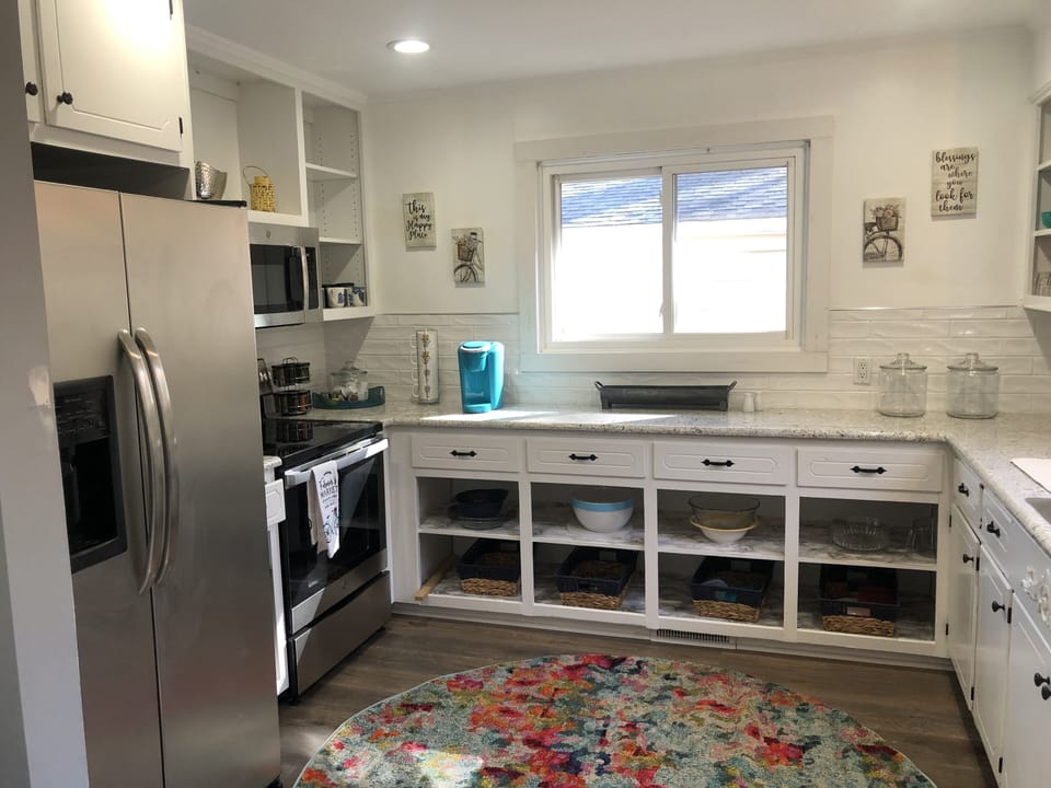 All new kitchen with stainless steel appliances, granite counters