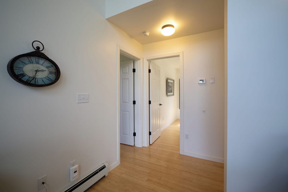 Hall to Primary and Queen Bedrooms