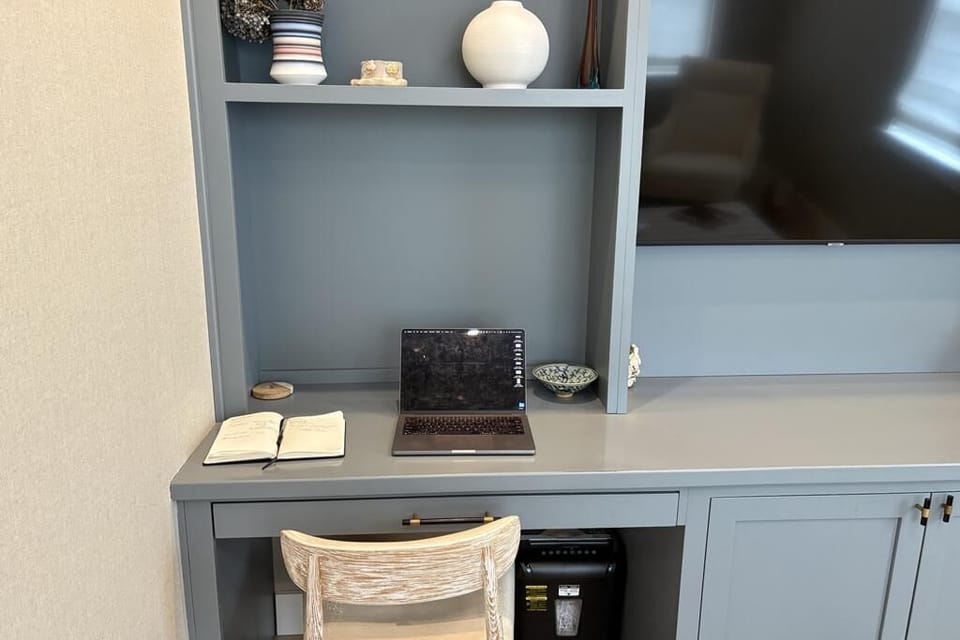 home office complete with desk, chair, monitor