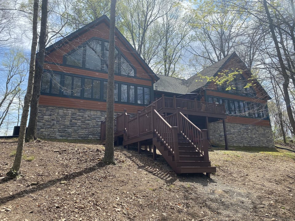 First set of steps leading straight down to lake access for fishing & swimming. 