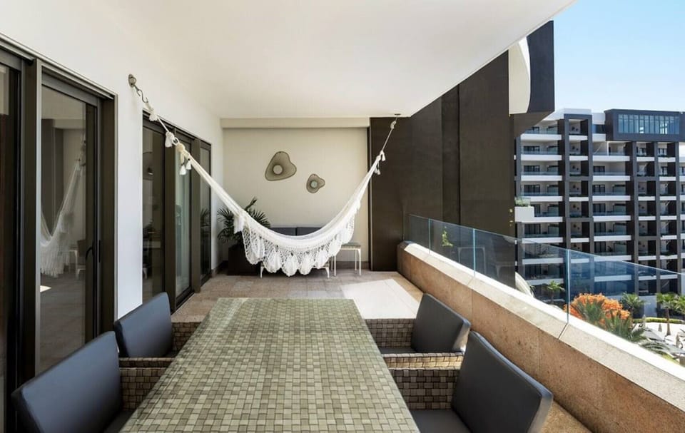 The apartment's large balcony includes high quality dining and lounge furniture!