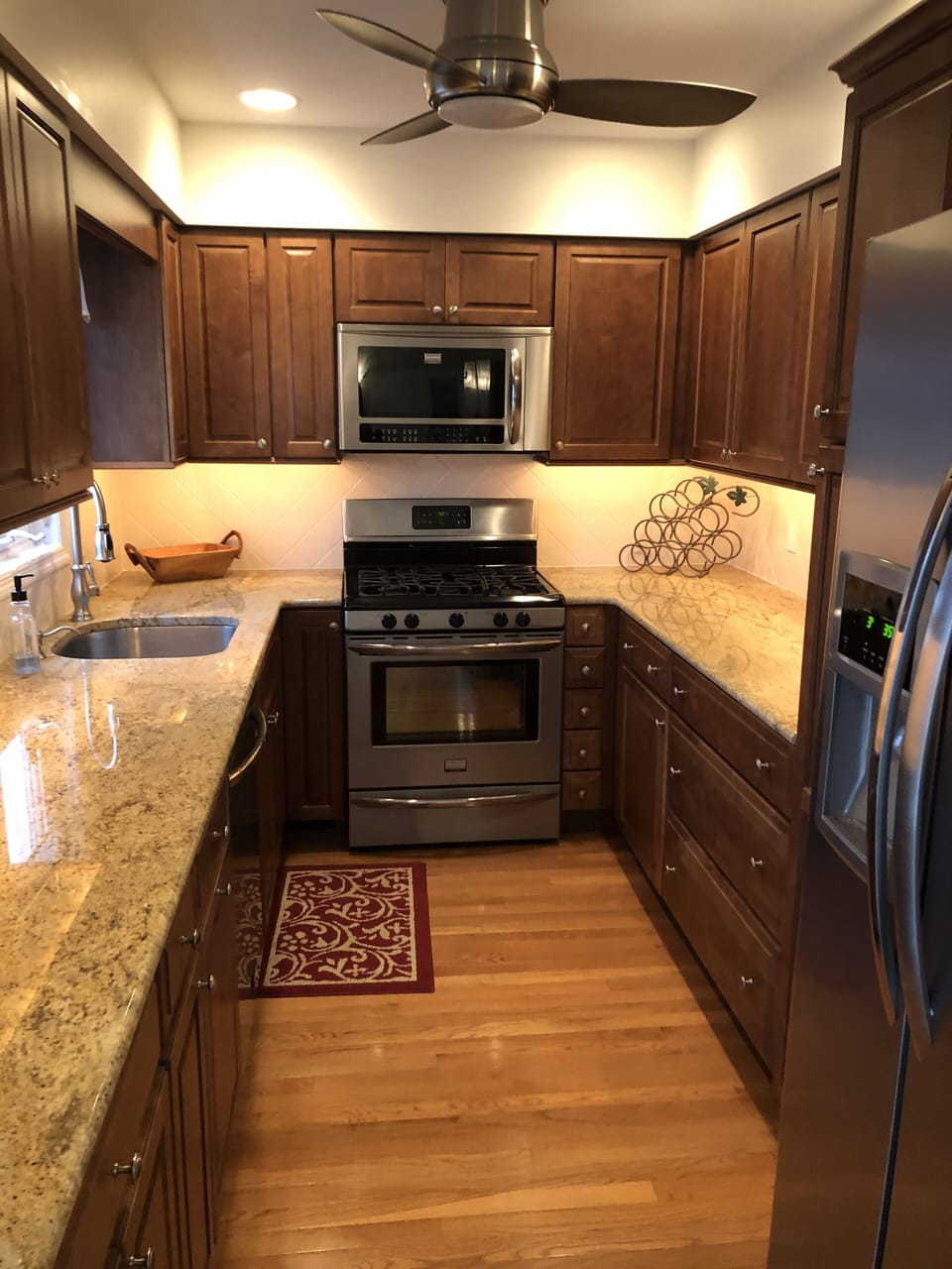 Galley kitchen with modern appliances