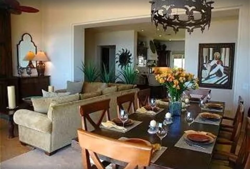 Dining area in the great room with pouded copper table which opens to terrace.