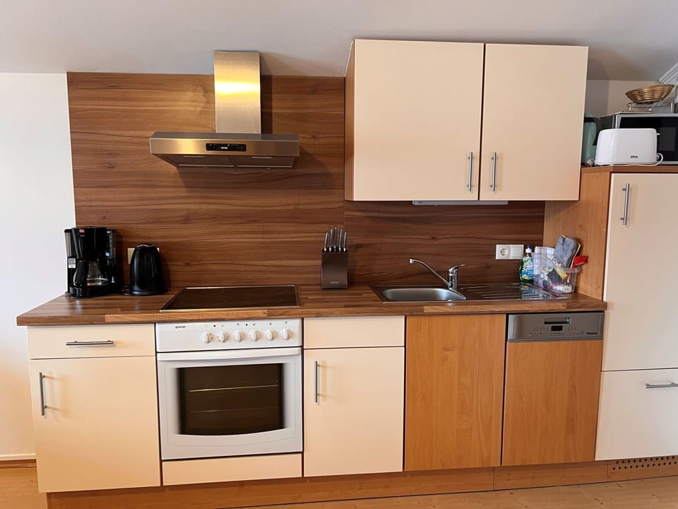 Cabinetry, Countertop, Property, Kitchen Sink, Furniture, Building, Kitchen Stove, Kitchen Appliance, Wood, Kitchen