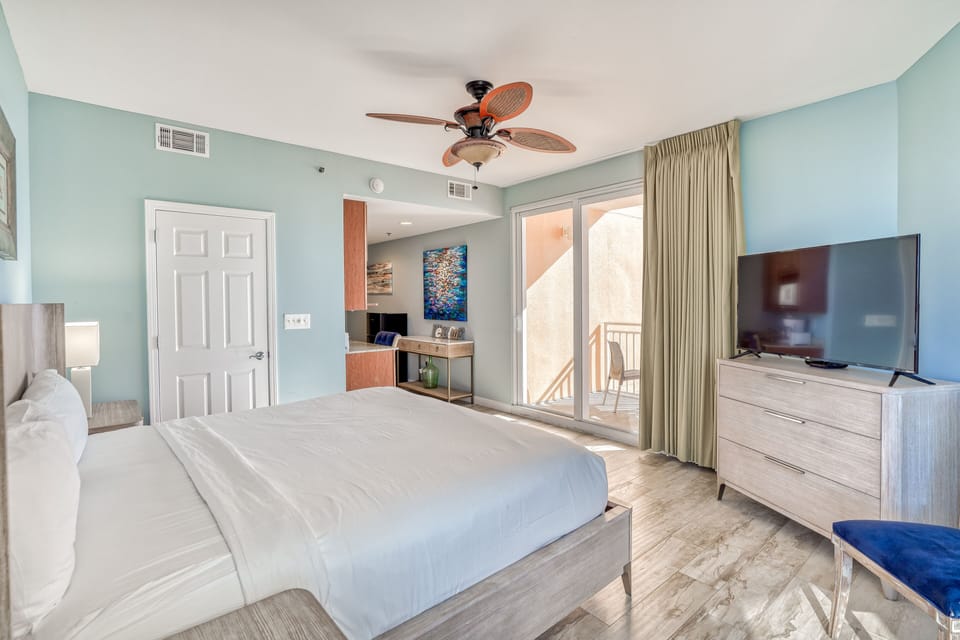 King bed and sleeper sofa (sleeps 3), bathroom, kitchenette, private balcony