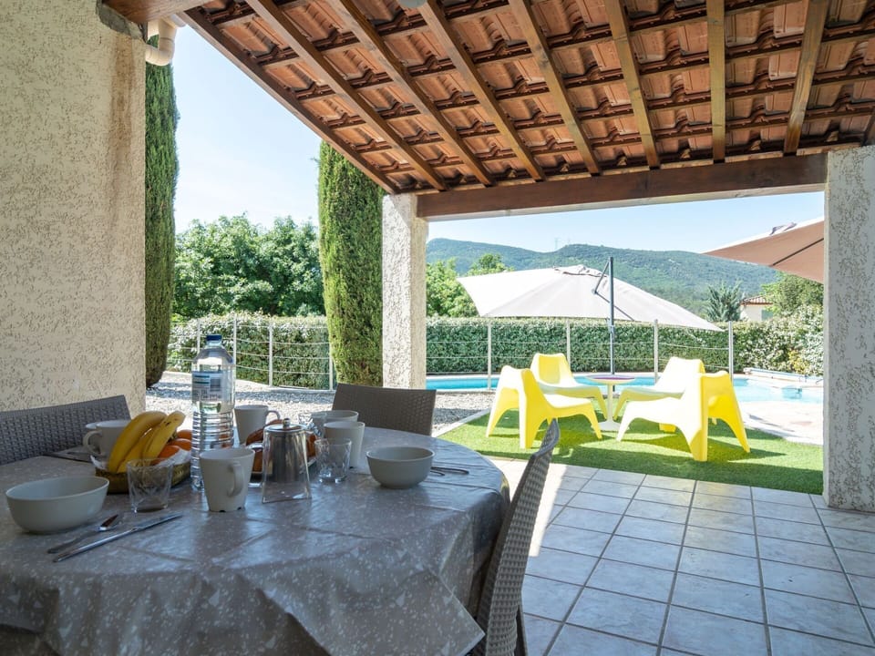 Table, Furniture, Property, Sky, Tableware, Plant, Chair, Shade, Interior Design, Outdoor Furniture