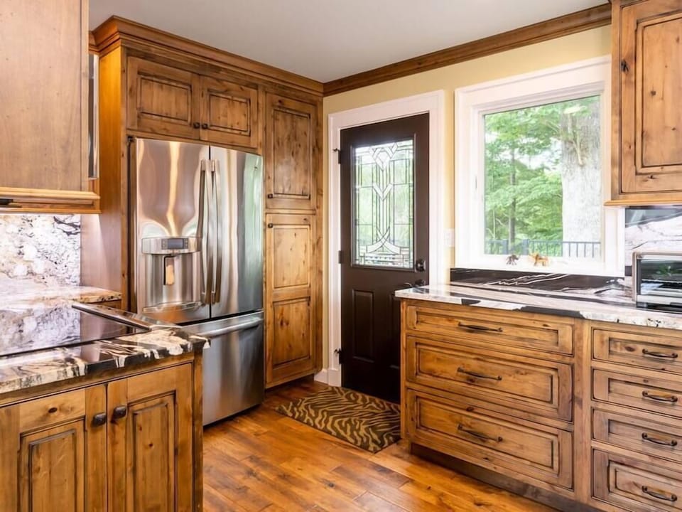 Custom built kitchen with stainless steel appliances
