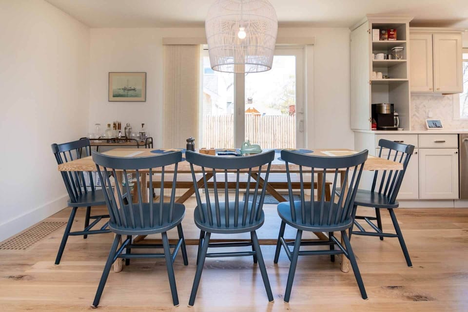 Dining Area Has Sliding Glass Doors Leading Out to the Patio