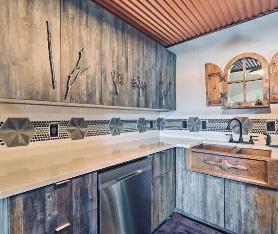 Custom kitchen -copper sink, handmade cabinet hardware, custom tile, stain glass