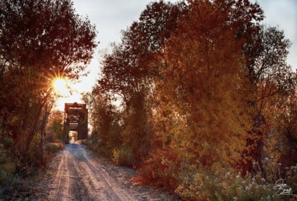Private entryway across 100-year old railroad bridge crossing the Wind River.