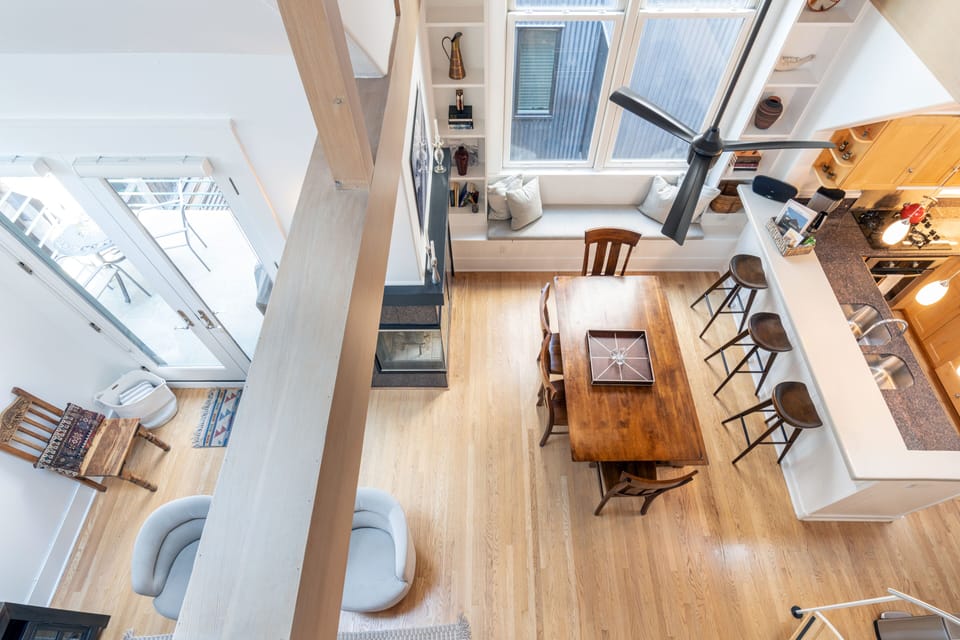 View of living area below from the loft
