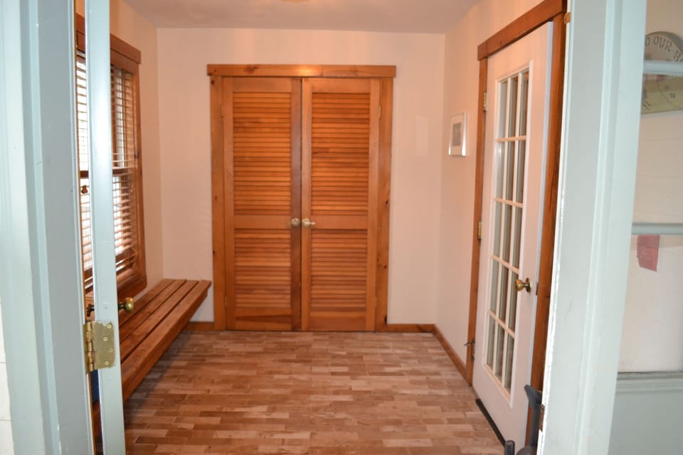 Mud room with large walk in closet