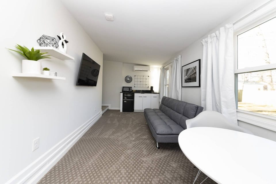 Relax on the sofa while watching the Flat screen TV or convert the Futon to a Full Size bed.