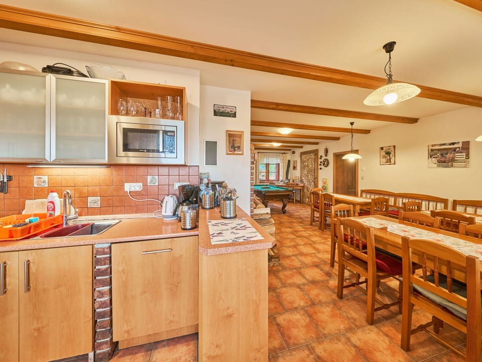 Furniture, Wood, Interior Design, Ceiling, Table, Kitchen & Dining Room Table, Flooring, Floor, Dining Room, Chair