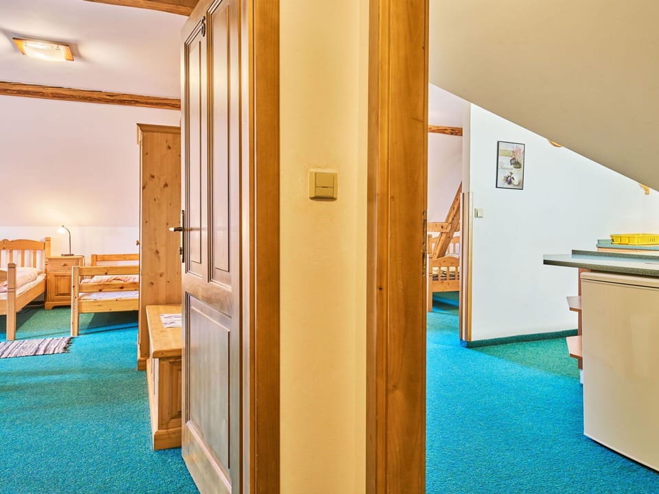 Ceiling, Interior Design, Floor, Room, Hardwood, Attic, Wood Stain, Hotel, Bedroom, Cabinetry
