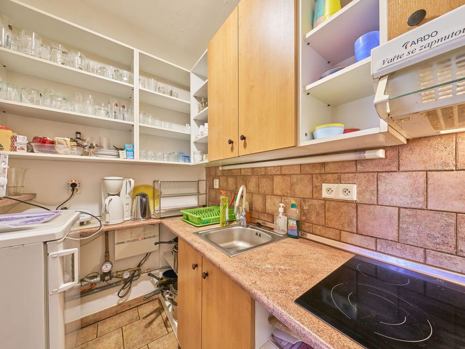 Kitchen, Kitchen Appliance, Major Appliance, Countertop, Flooring, Interior Design, Cabinetry, Floor, Room, Kitchen Sink
